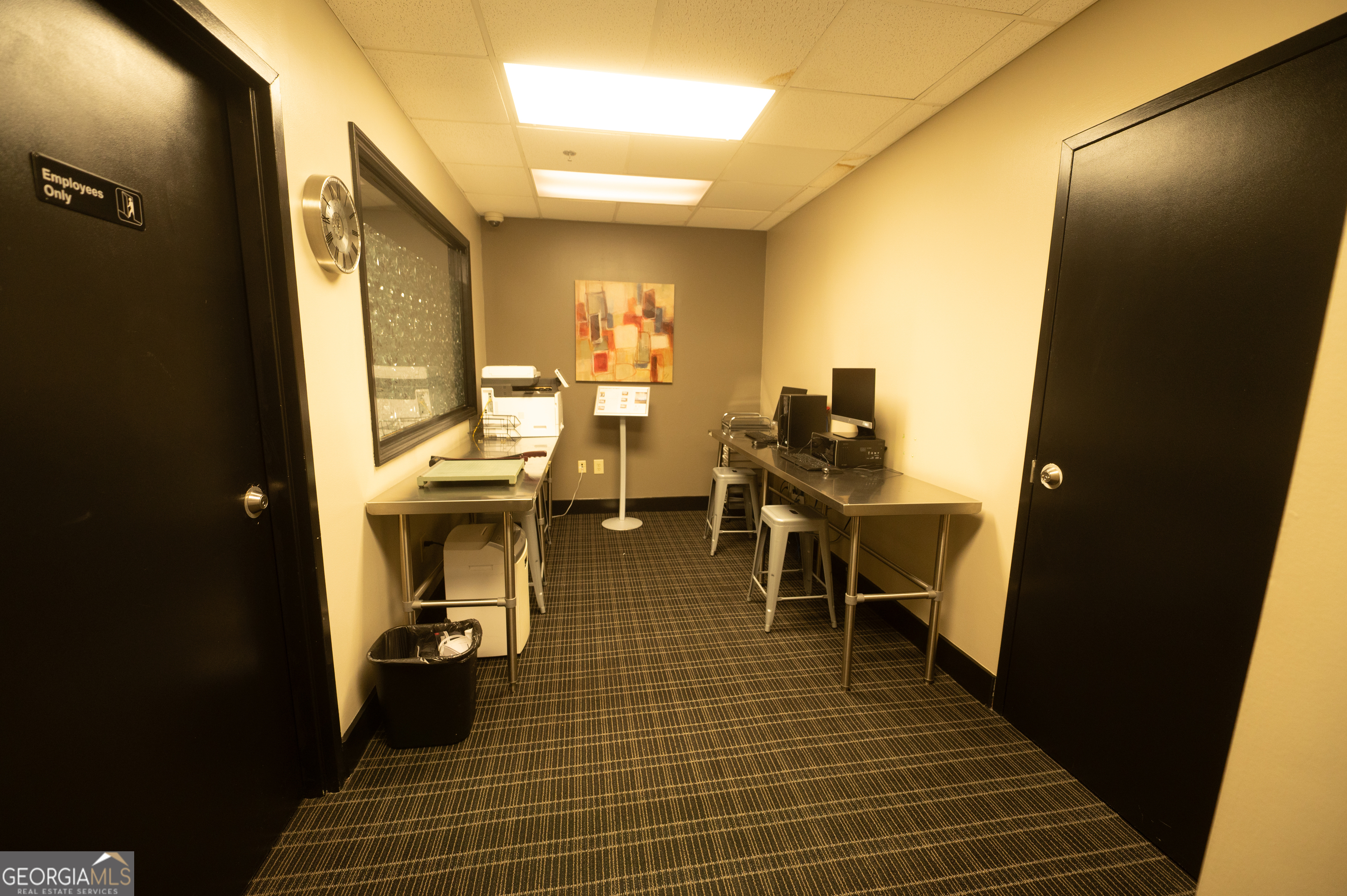 620 Peachtree Street Northeast, Unit 1501 Atlanta, GA 30308 - Photo 15 of 18 a room with wooden floor and furniture