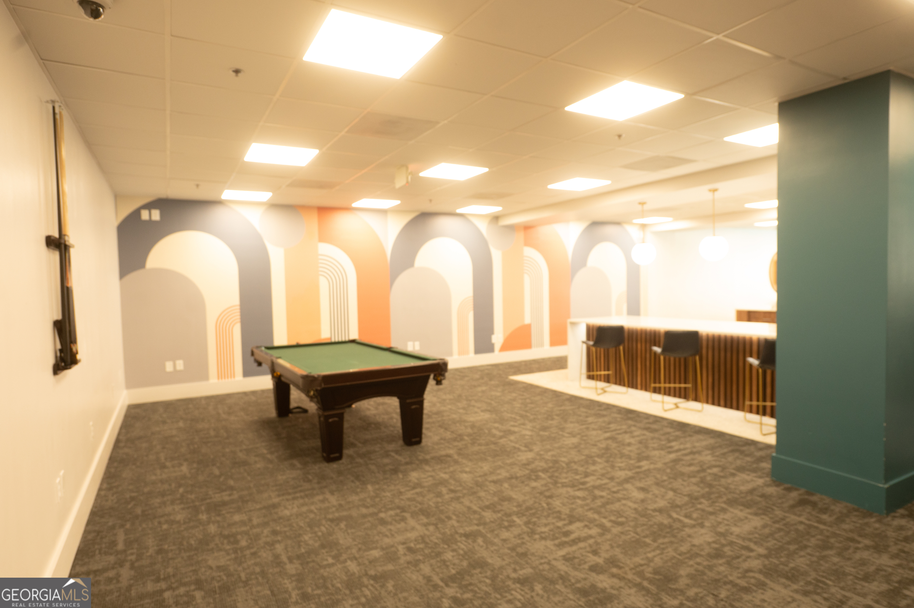 620 Peachtree Street Northeast, Unit 1501 Atlanta, GA 30308 - Photo 16 of 18 a living room with furniture a rug and a large window