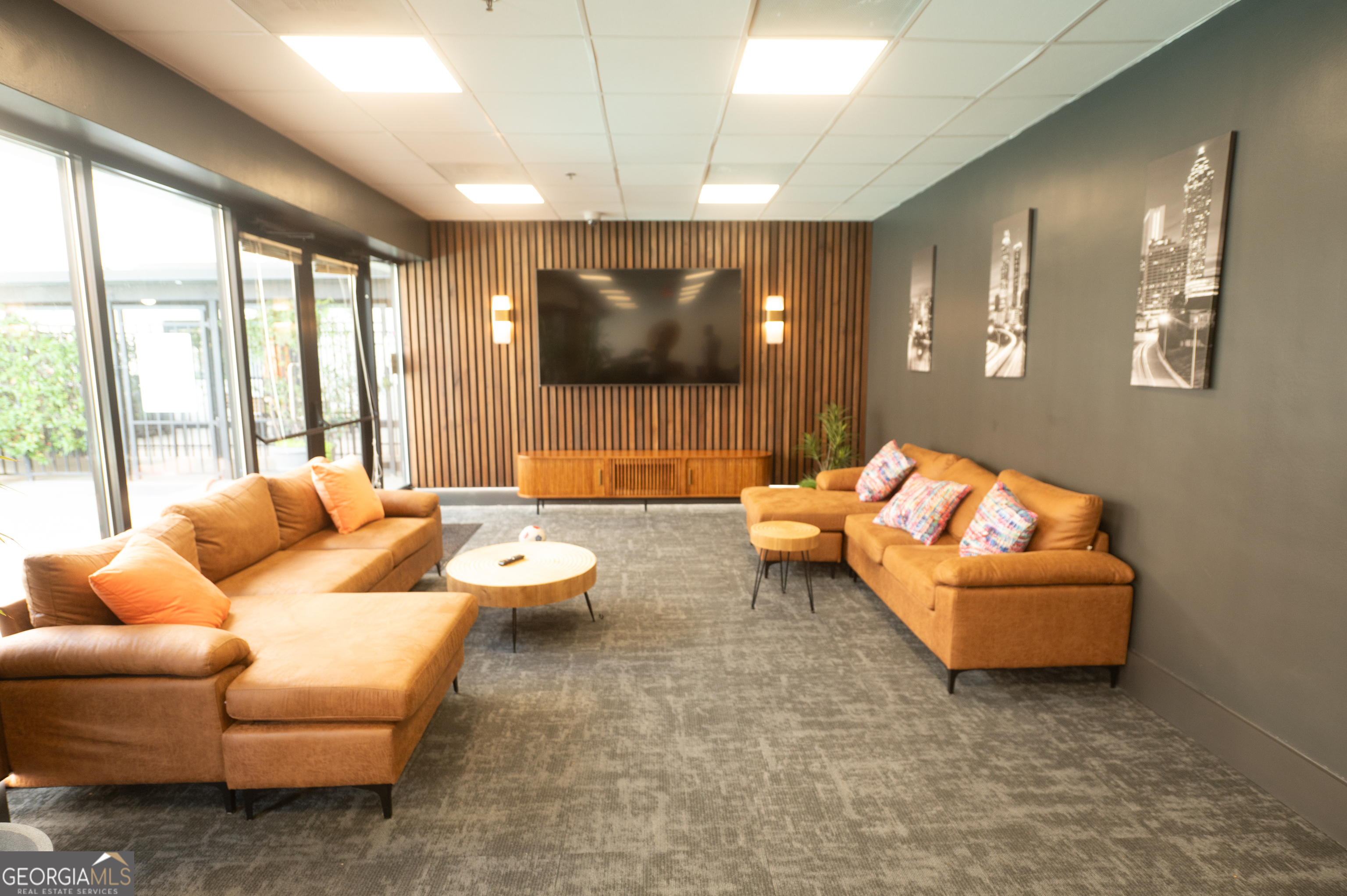 620 Peachtree Street Northeast, Unit 1501 Atlanta, GA 30308 - Photo 18 of 18 a living room with furniture and a large window