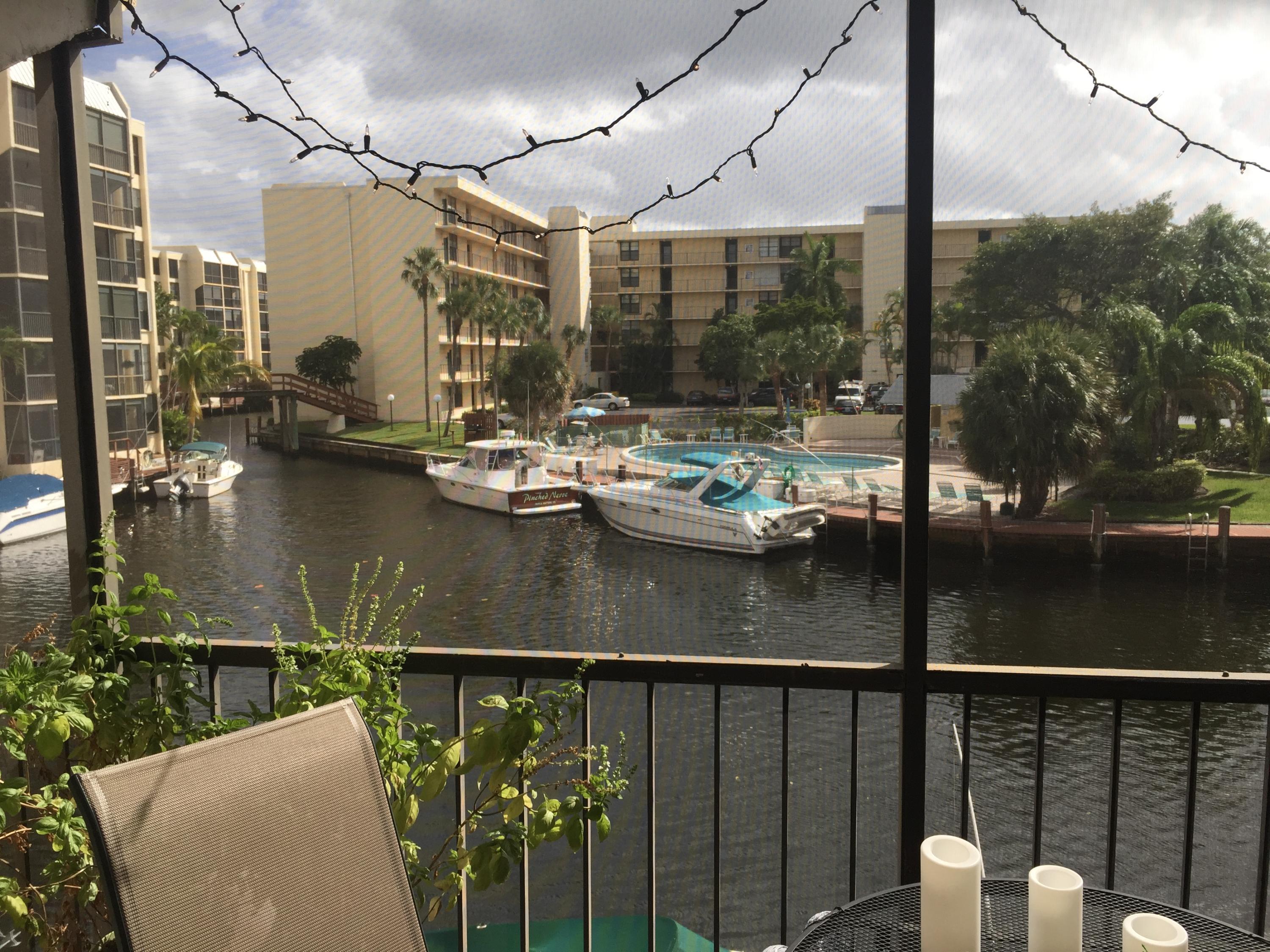 10 Royal Palm Way, Unit 2030 Boca Raton, FL 33432 - Photo 15 of 26 a view of swimming pool from a balcony