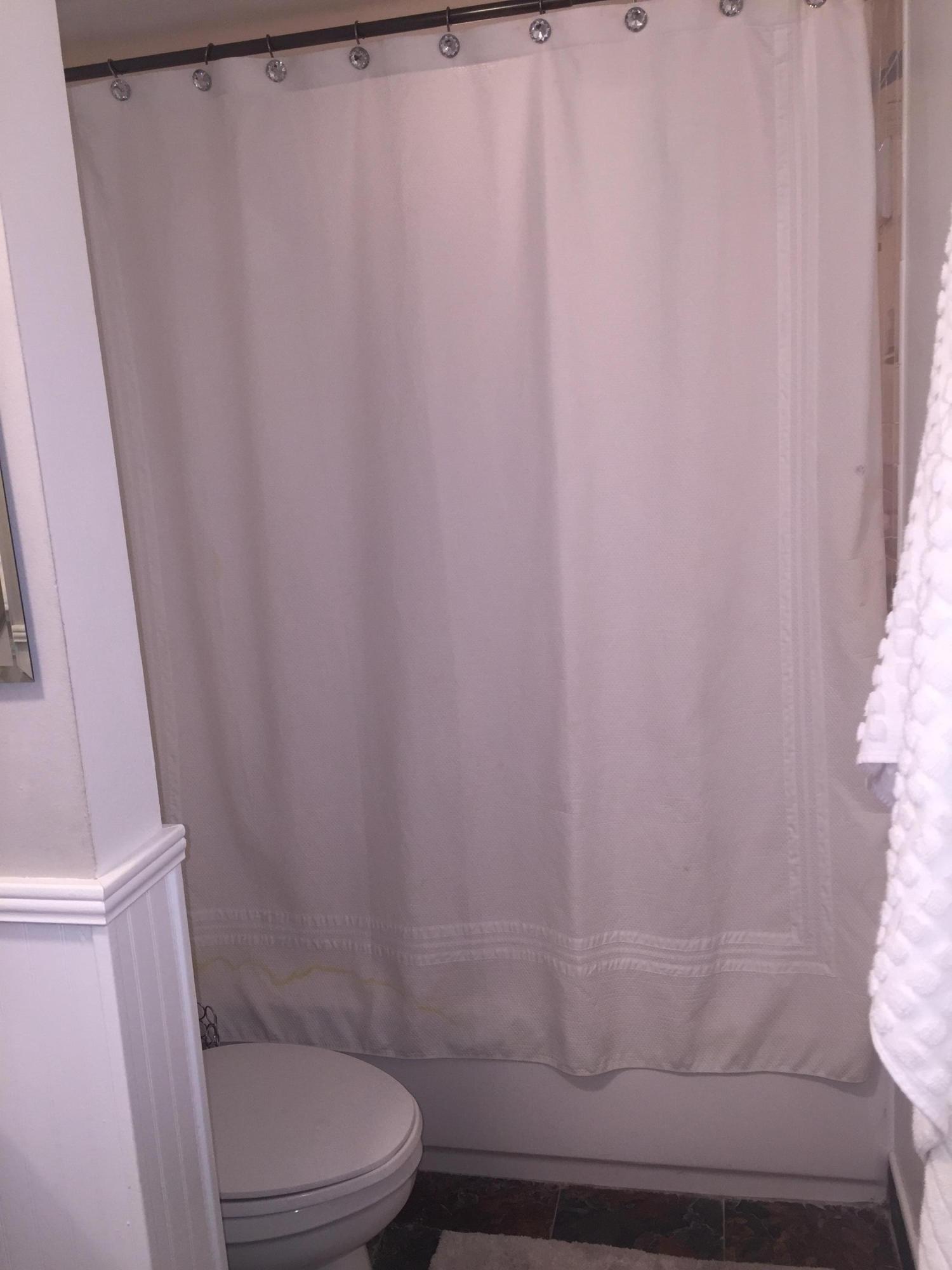 10 Royal Palm Way, Unit 2030 Boca Raton, FL 33432 - Photo 21 of 26 a white toilet sitting next to a shower