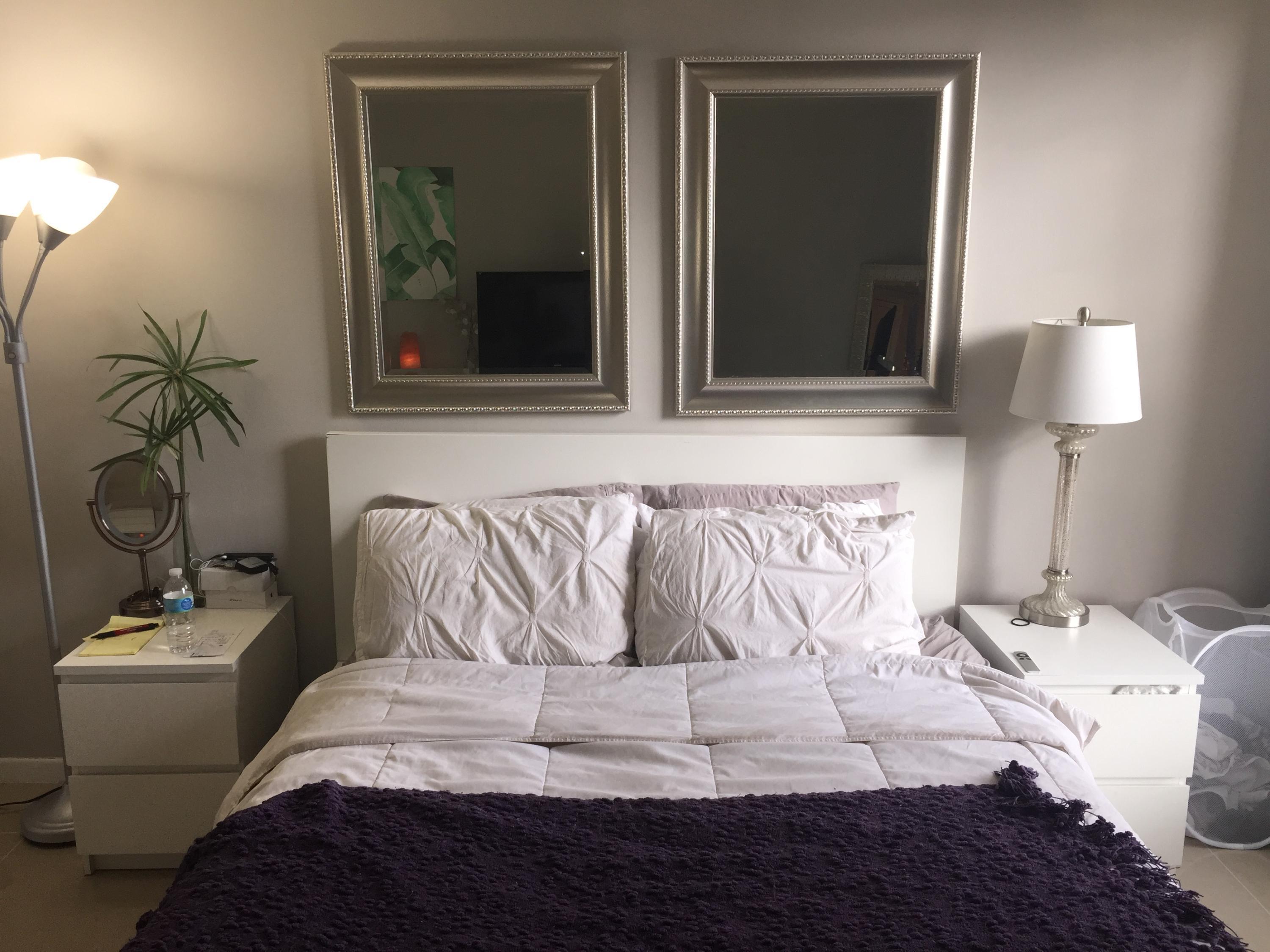 10 Royal Palm Way, Unit 2030 Boca Raton, FL 33432 - Photo 25 of 26 a bedroom with a bed and a lamp