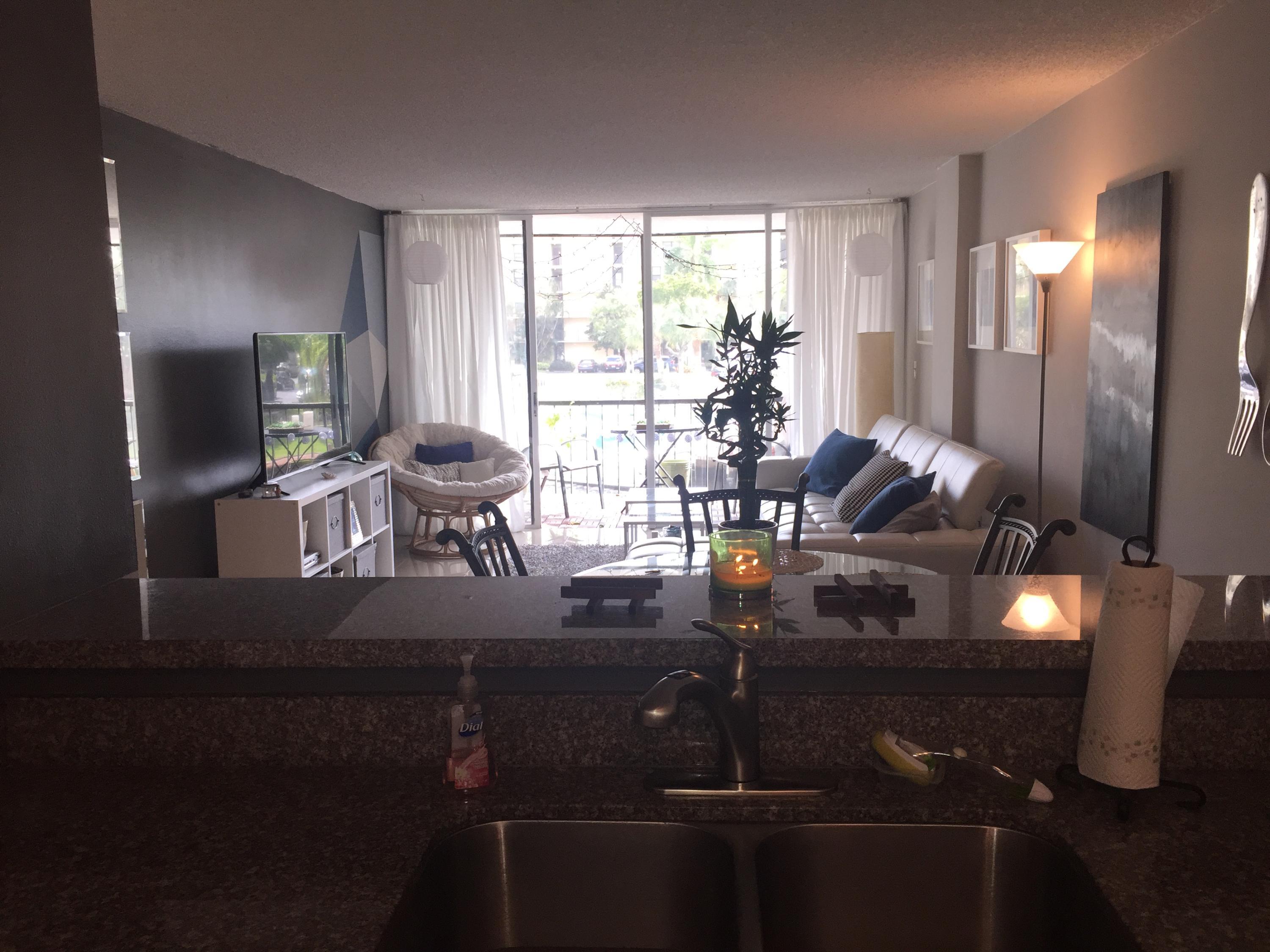 10 Royal Palm Way, Unit 2030 Boca Raton, FL 33432 - Photo 8 of 26 a view of a dining room with furniture