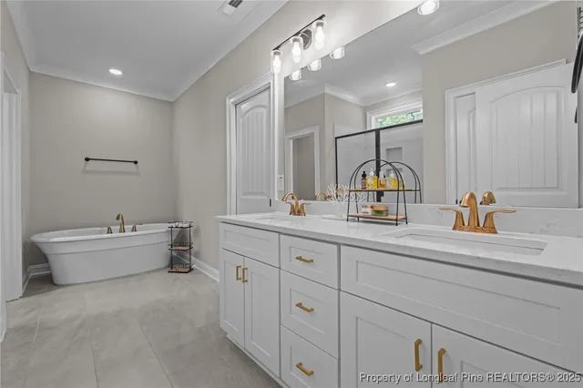 a bathroom with a double vanity sink a toilet and mirror