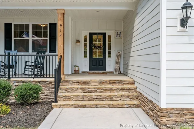a view of a entryway door front of house
