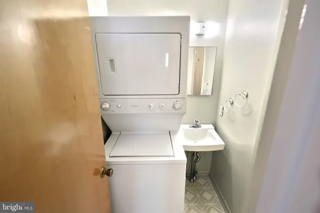 a bathroom with a shower and mirror