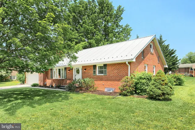 a view of backyard with garden and plants