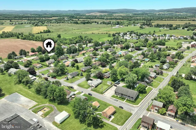 a view of a trees with a yard