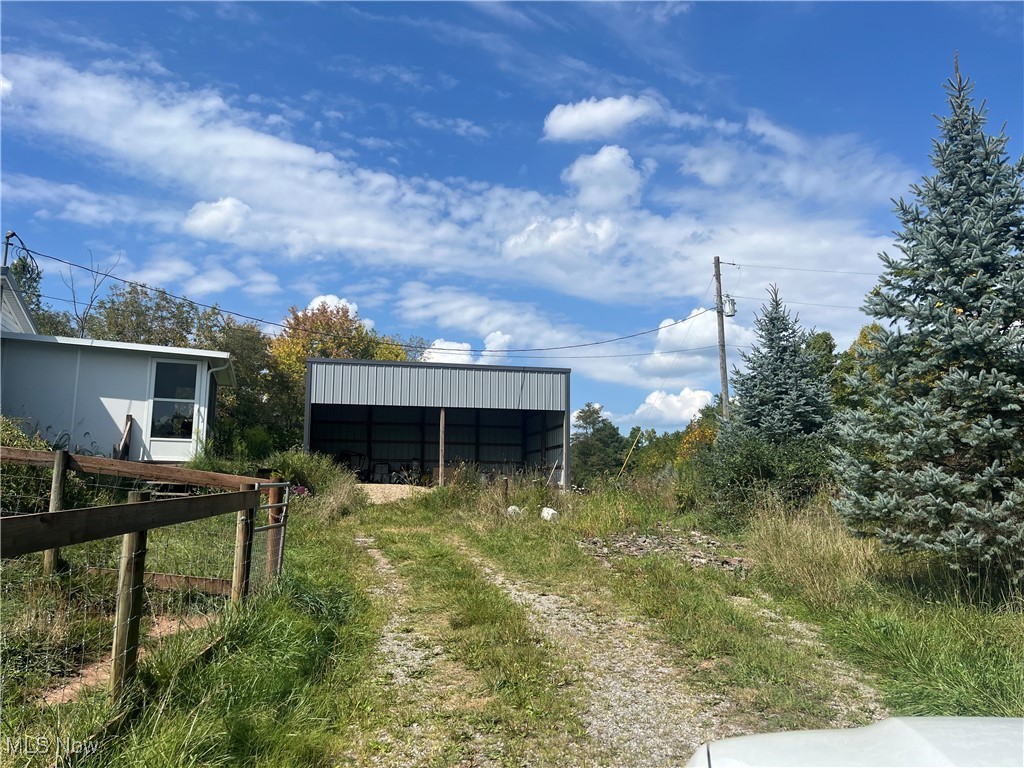 76303 Science Hill Road Kimbolton, OH 43749 - Photo 4 of 18 View of yard featuring an outdoor structure