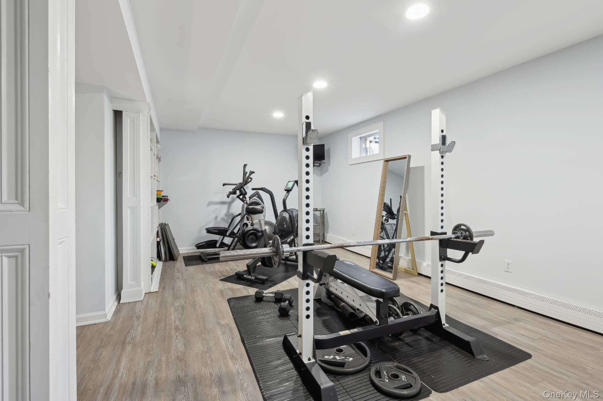 47 Bathing Beach Road Southampton, NY 11968 - Photo 19 of 20 a view of a room with gym equipment