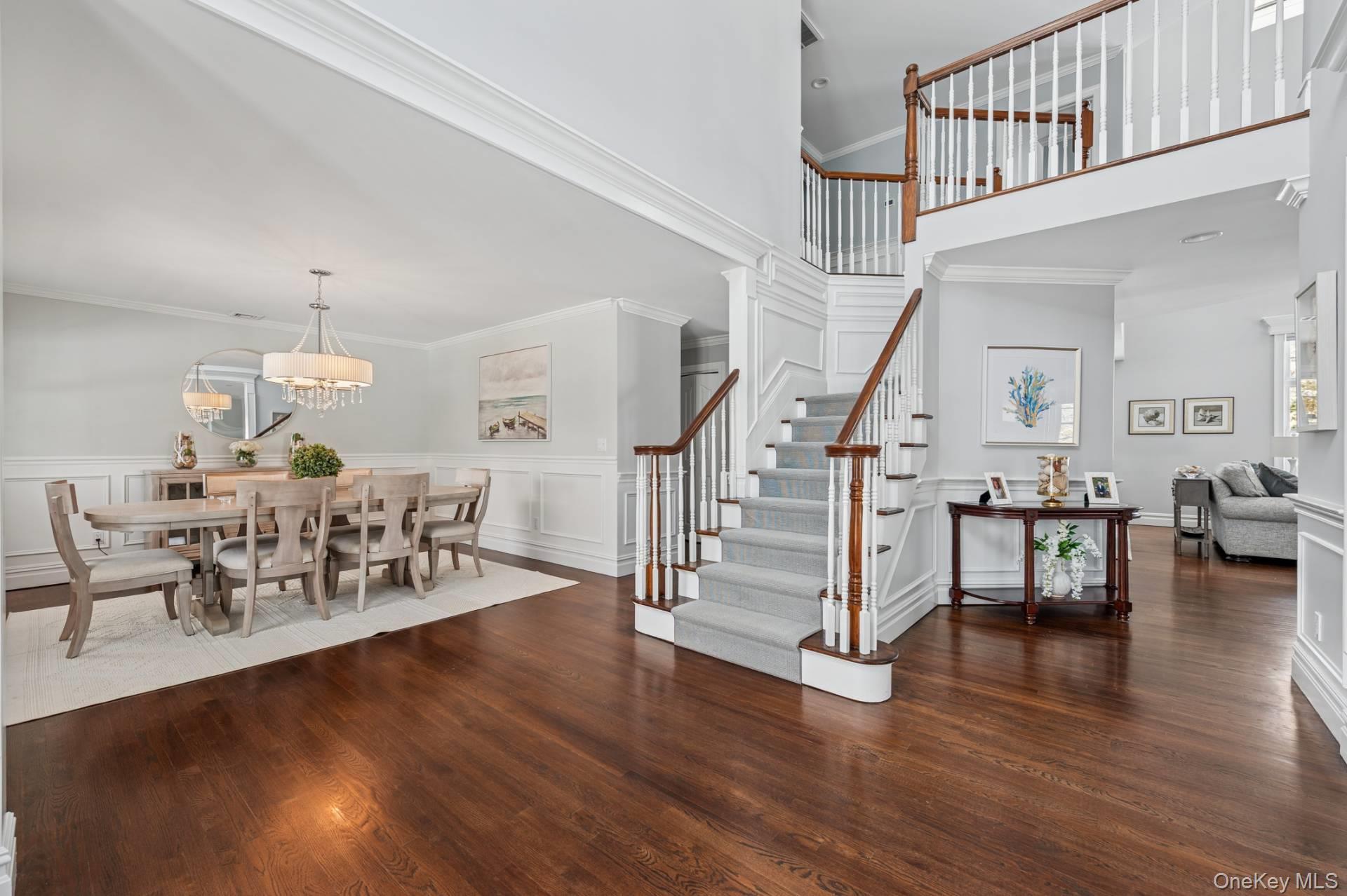 47 Bathing Beach Road Southampton, NY 11968 - Photo 3 of 20 a living room with lots of furniture and wooden floors