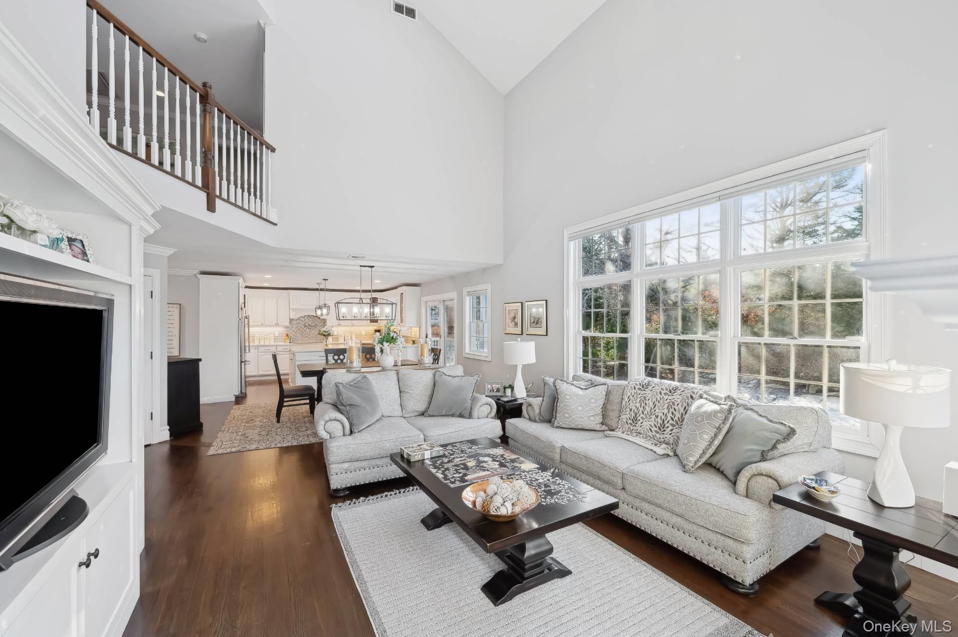 47 Bathing Beach Road Southampton, NY 11968 - Photo 5 of 20 a living room with furniture and a flat screen tv