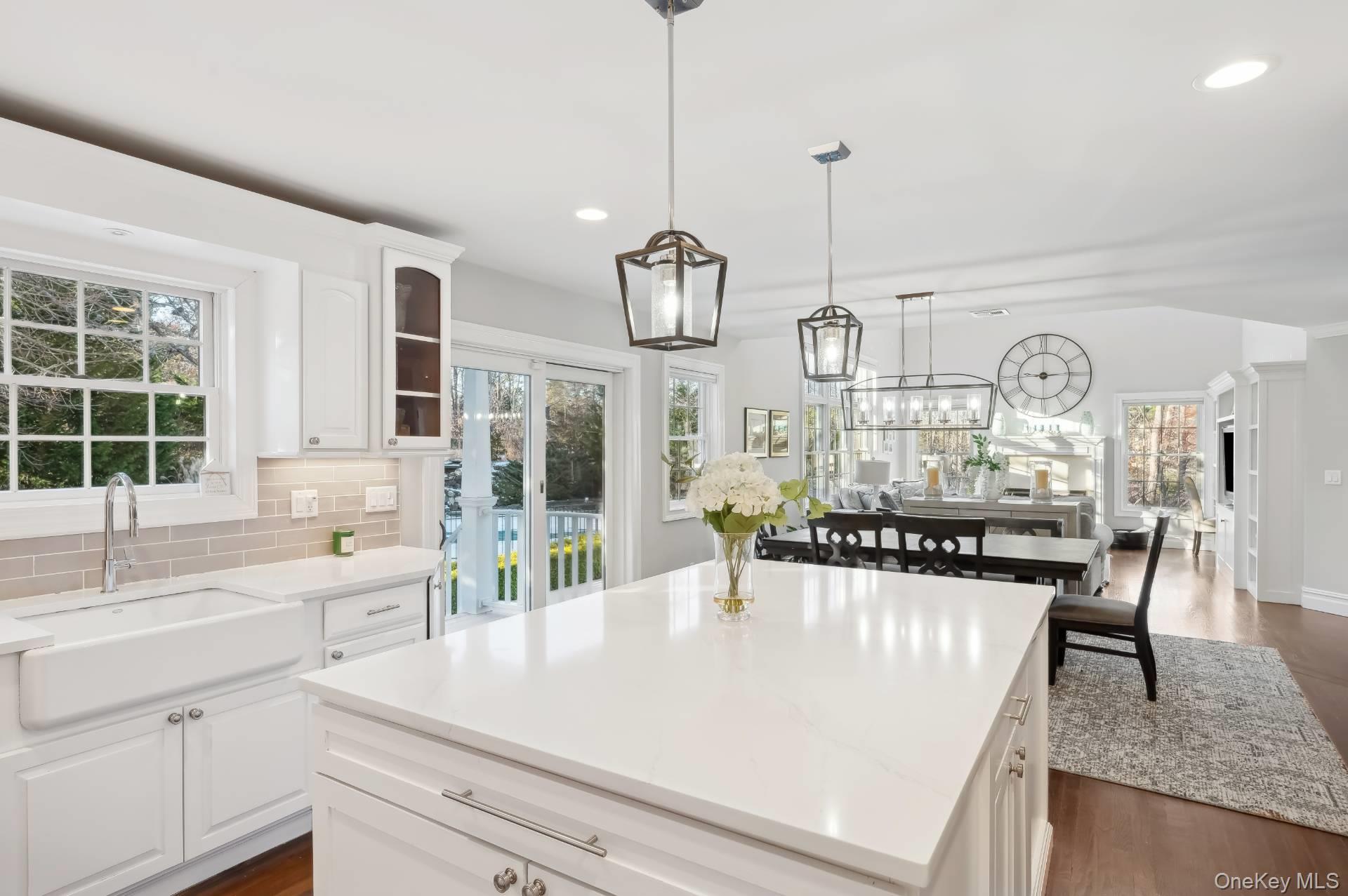 47 Bathing Beach Road Southampton, NY 11968 - Photo 7 of 20 a kitchen with counter top space and living room