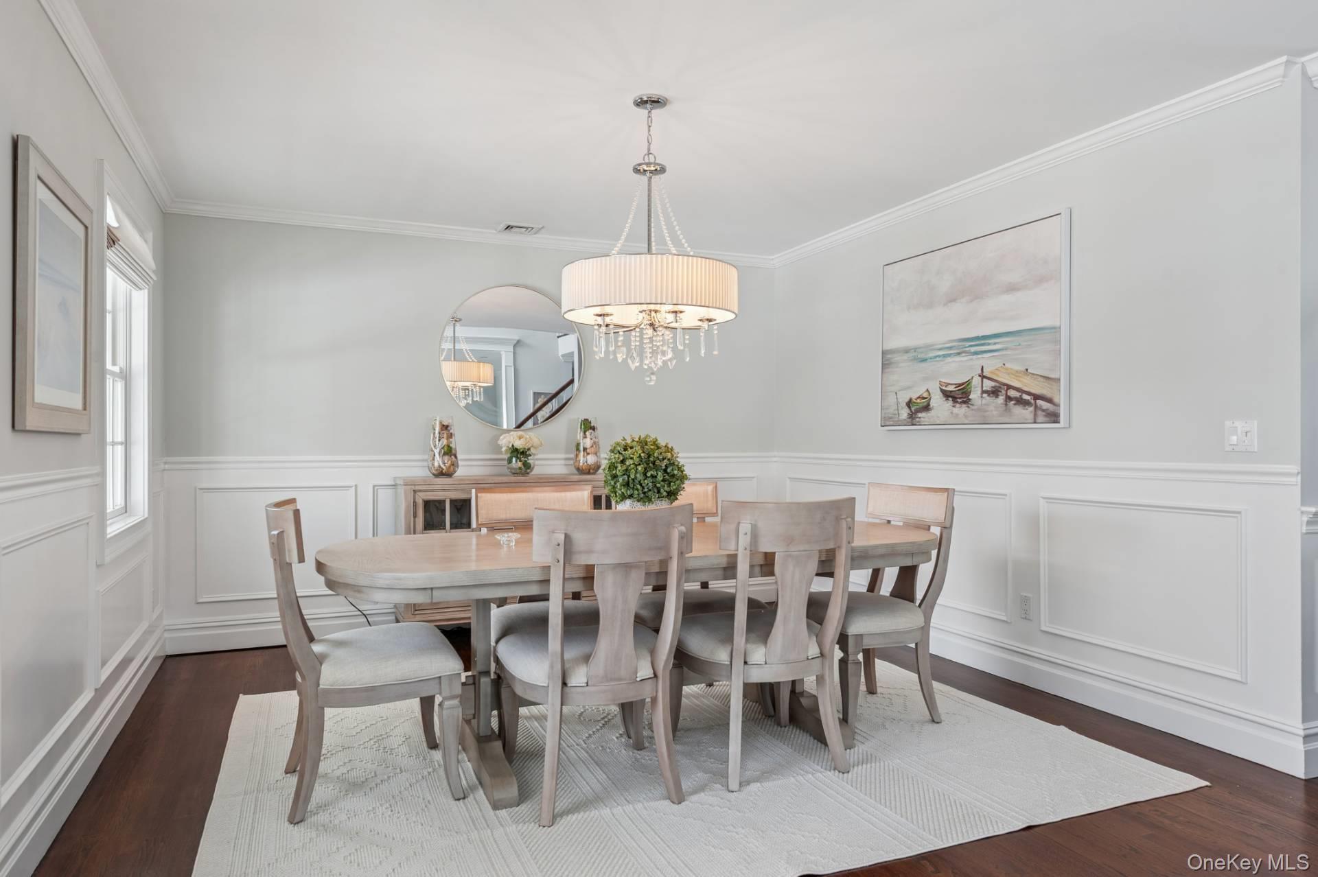 47 Bathing Beach Road Southampton, NY 11968 - Photo 9 of 20 a view of a dining room with furniture and wooden floor