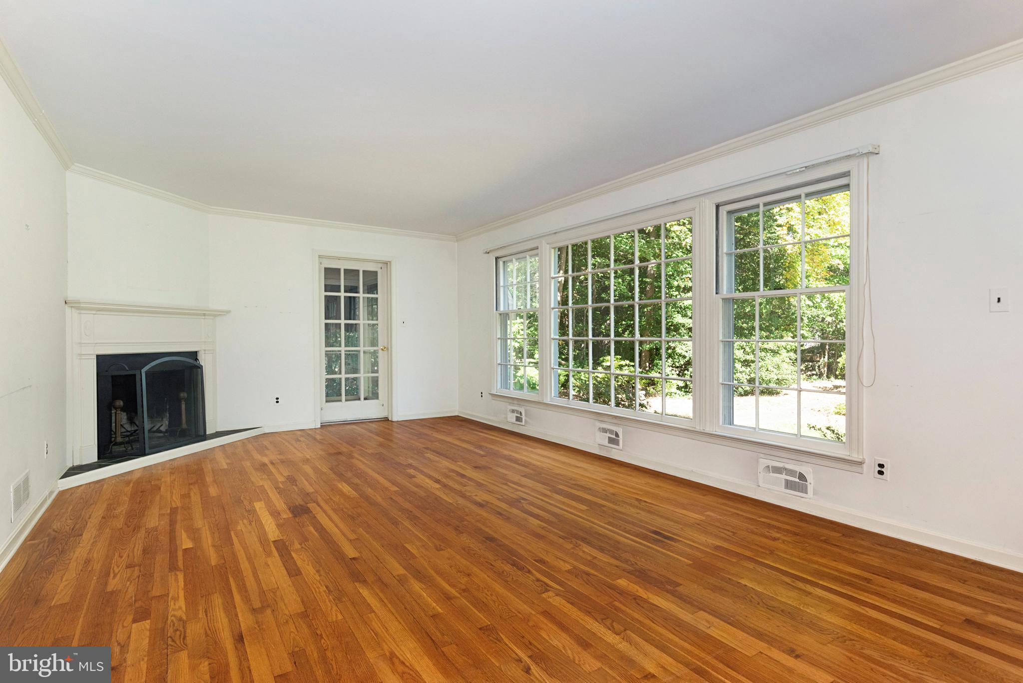 1619 Ridout Road Annapolis, MD 21409 - Photo 5 of 37 Living Room w/ Wood burning Fireplace & Hardwoods
