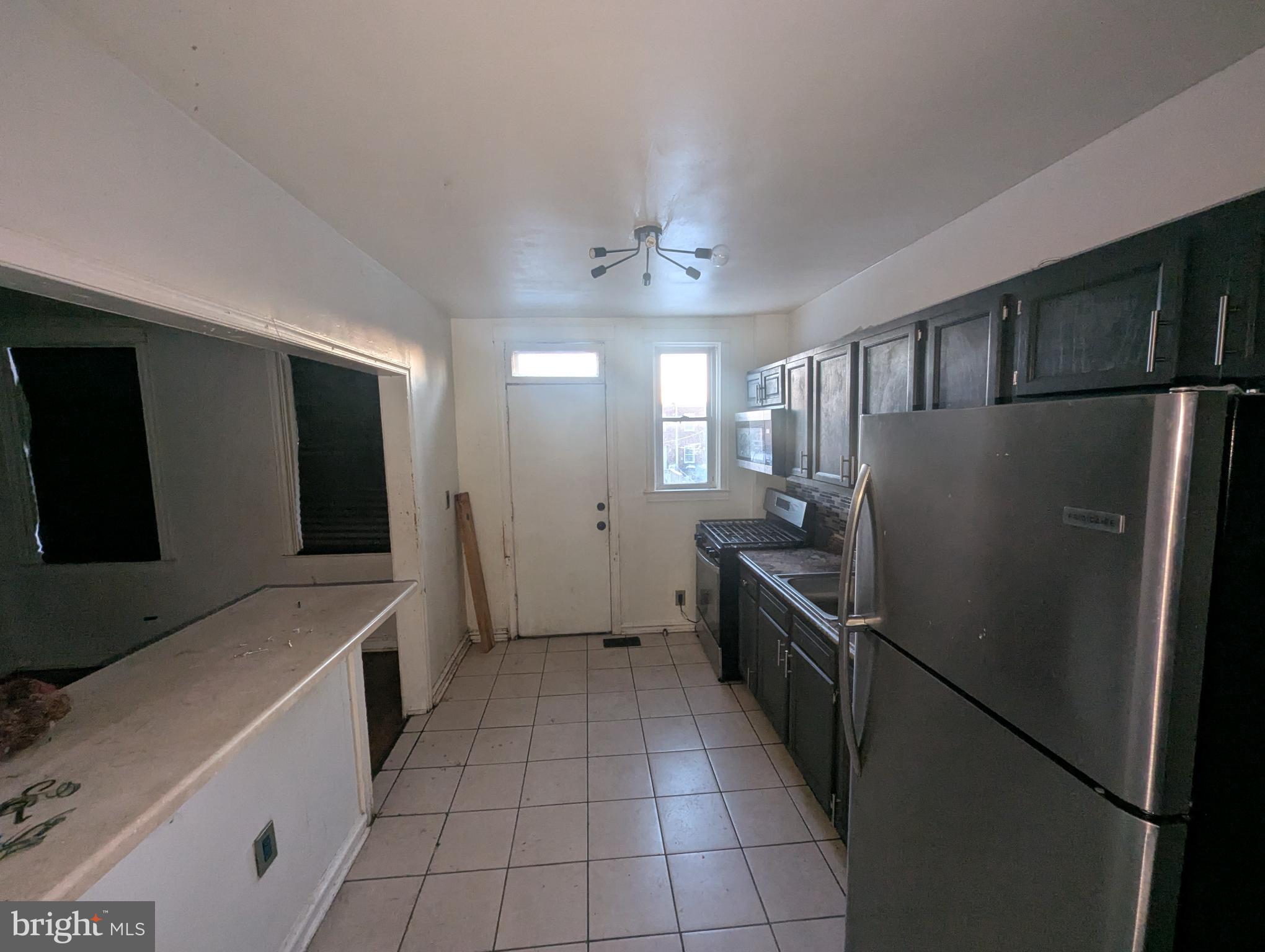 3602 Chesterfield Avenue Baltimore, MD 21213 - Photo 13 of 37 Modern kitchen with sleek appliances.