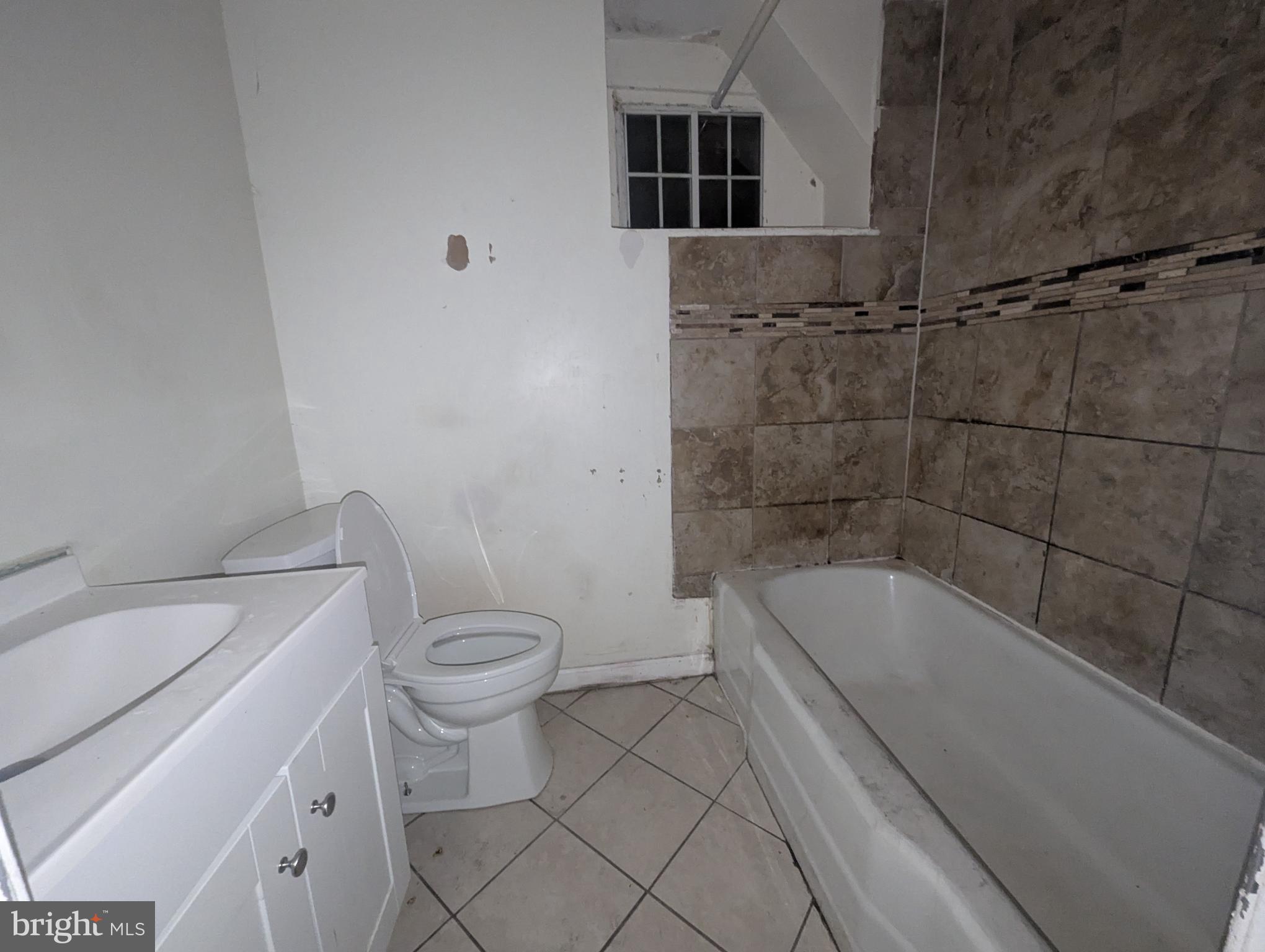 3602 Chesterfield Avenue Baltimore, MD 21213 - Photo 21 of 37 Spacious bathroom with modern tile accents.