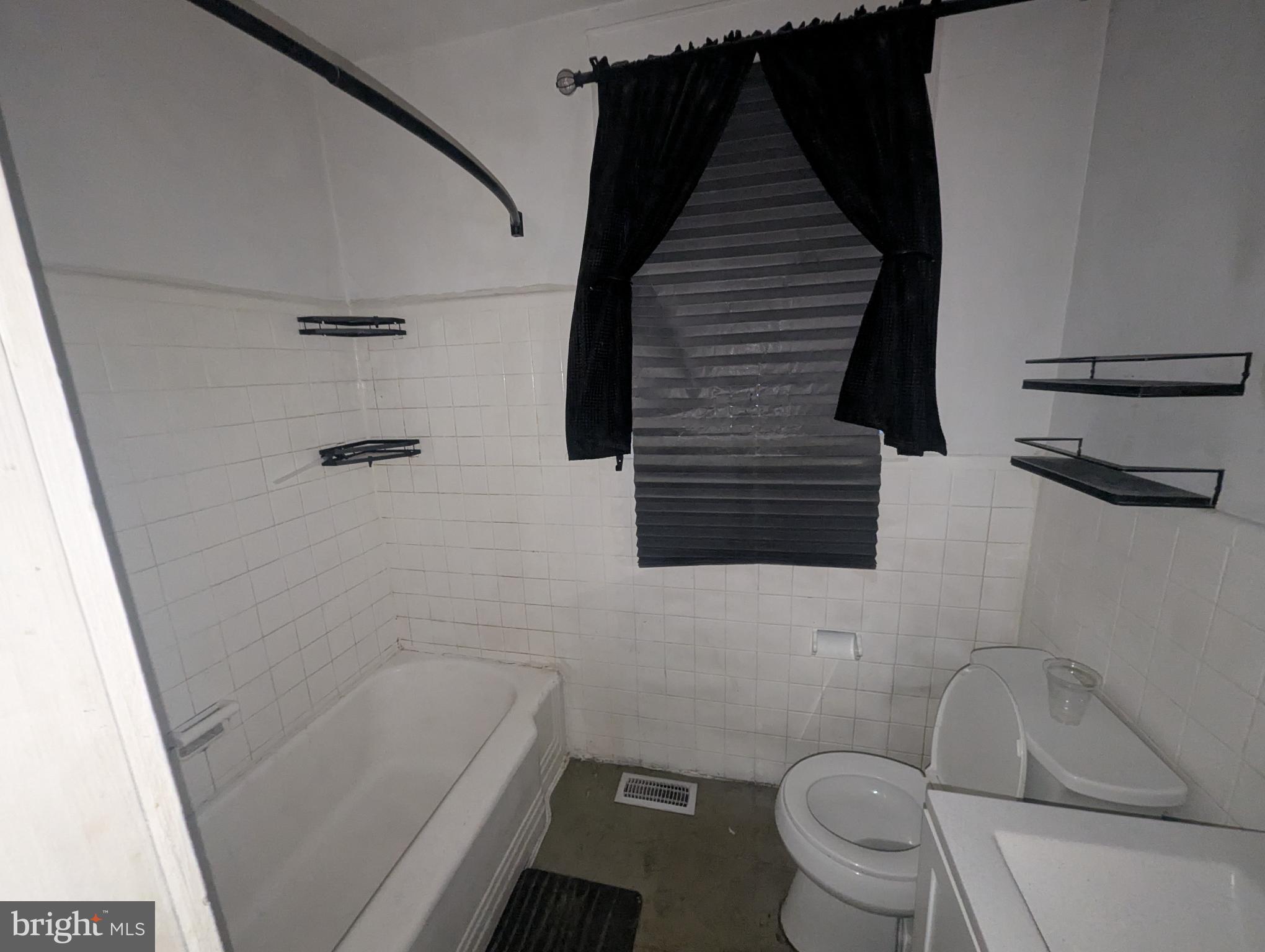 3602 Chesterfield Avenue Baltimore, MD 21213 - Photo 33 of 37 Modern bathroom with sleek design elements.