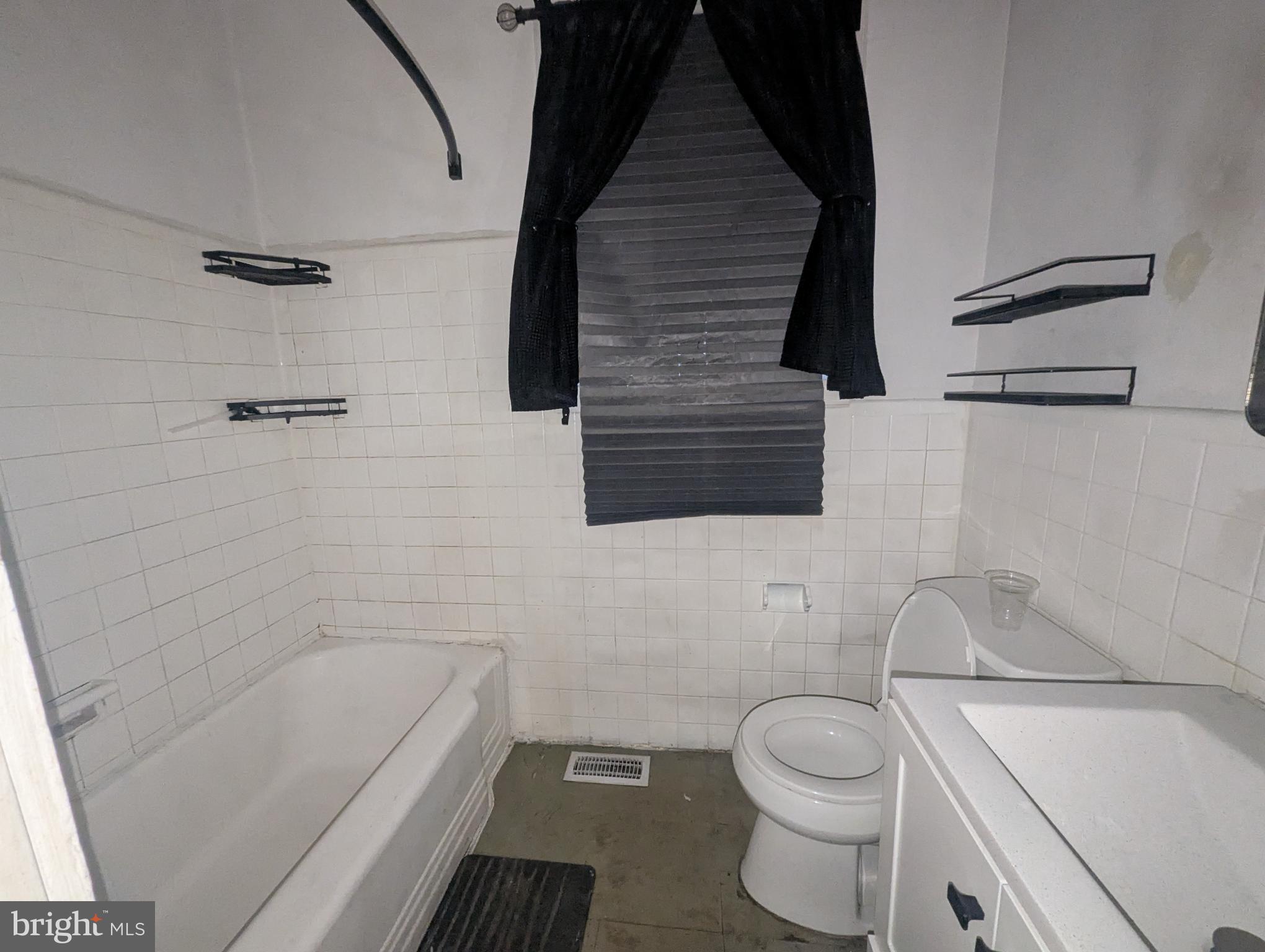 3602 Chesterfield Avenue Baltimore, MD 21213 - Photo 34 of 37 Charming bathroom with classic tile accents.
