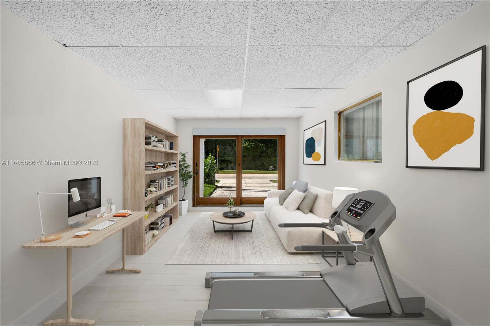 2385 North Bay Road Miami Beach, FL 33140 - Photo 25 of 36 a living room with furniture and a flat screen tv