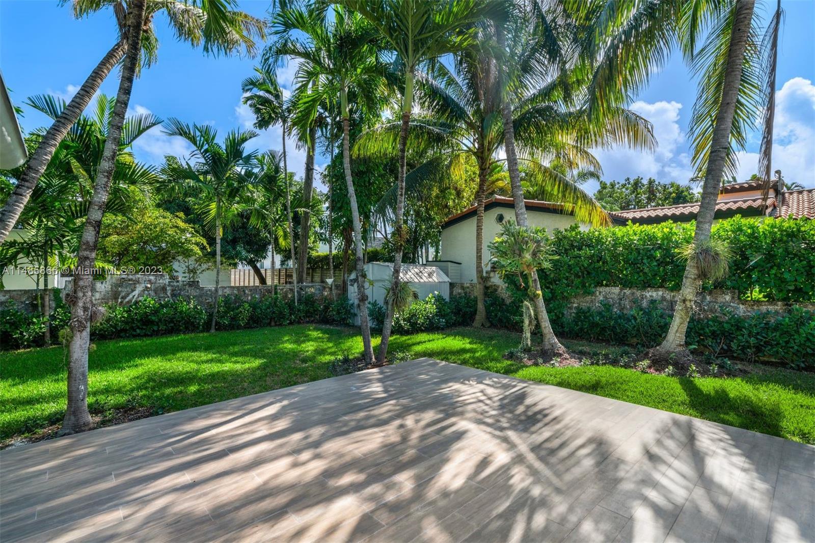 2385 North Bay Road Miami Beach, FL 33140 - Photo 28 of 36 a view of a backyard
