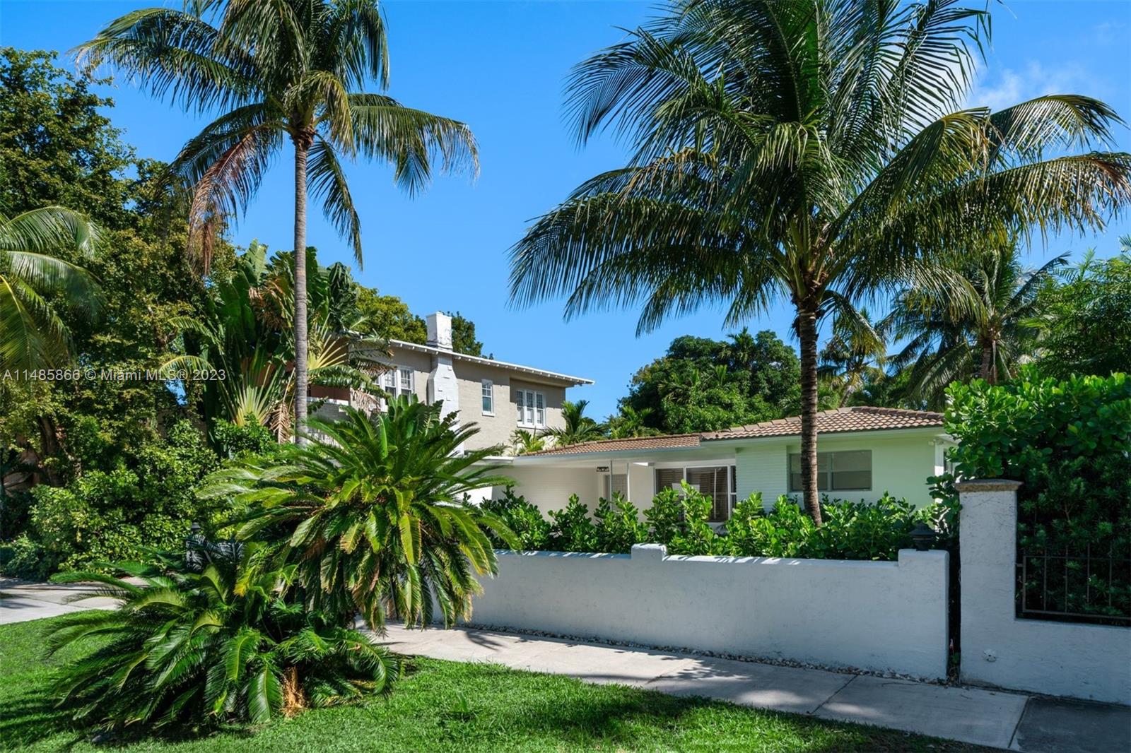 2385 North Bay Road Miami Beach, FL 33140 - Photo 36 of 36 a view of a palm trees in front of a house