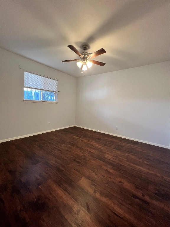 6003 Cameron Road, Unit A Austin, TX 78723 - Photo 16 of 25 a view of a room with wooden floor and a ceiling fan