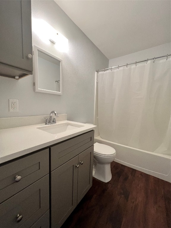 6003 Cameron Road, Unit A Austin, TX 78723 - Photo 21 of 25 a bathroom with a toilet a sink and mirror