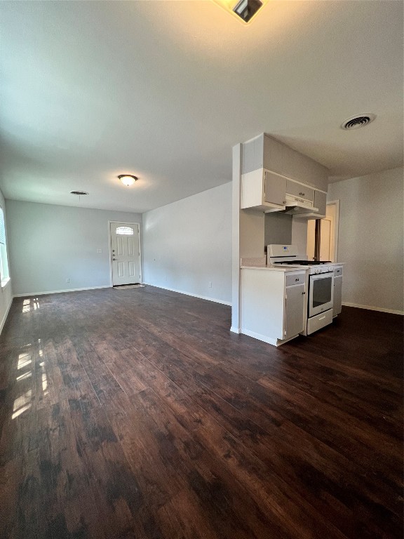 6003 Cameron Road, Unit A Austin, TX 78723 - Photo 9 of 25 a view of a kitchen with wooden floor and electronic appliances