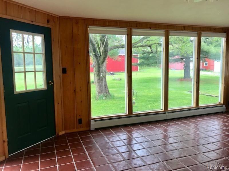 6436 Rossman Road Kingston, MI 48741 - Photo 14 of 16 6436 Rossman another view of sunroom.jpg