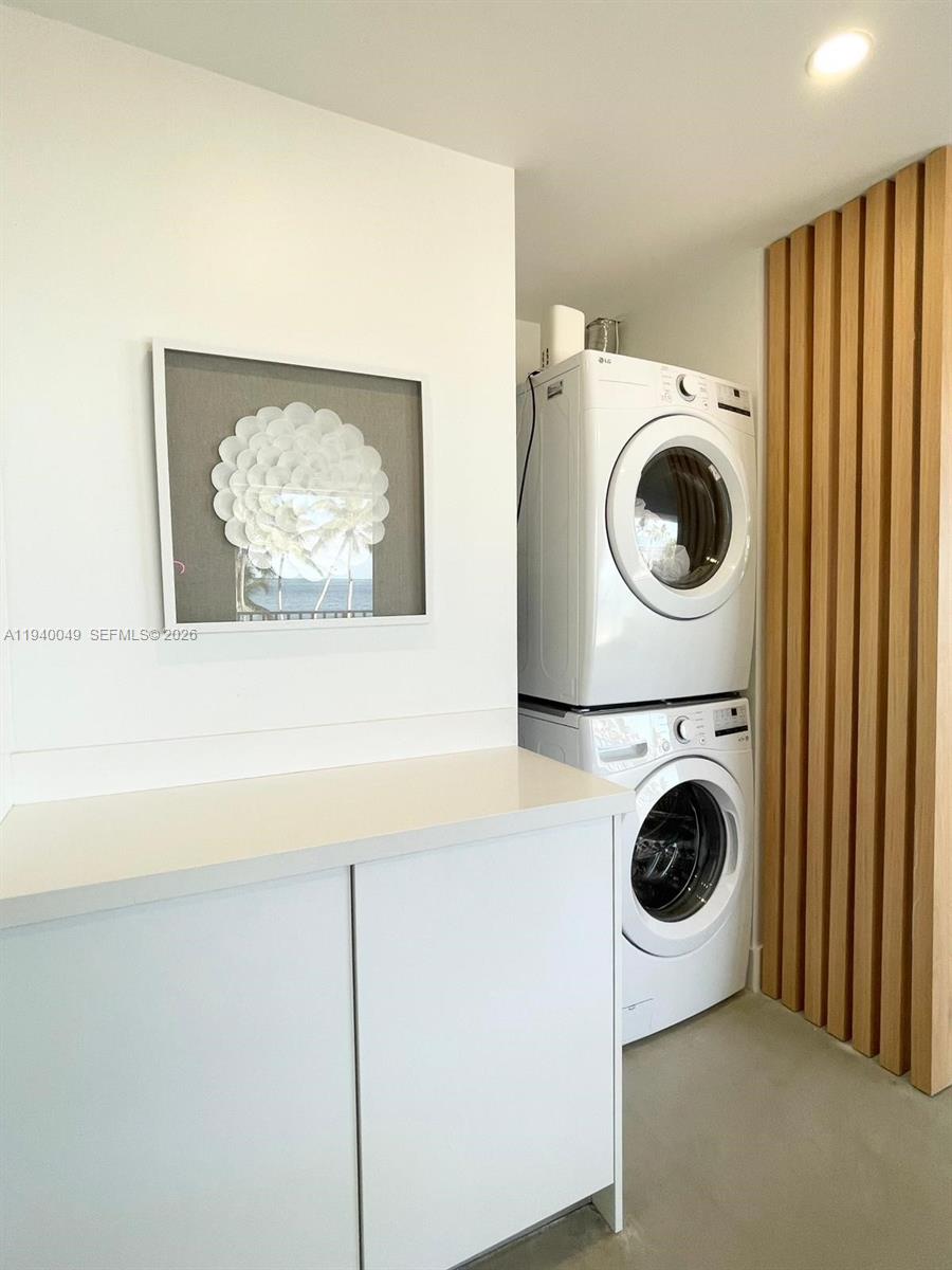 96180 Overseas Highway, Unit 1 Key Largo, FL 33037 - Photo 18 of 83 a utility room with dryer and washer