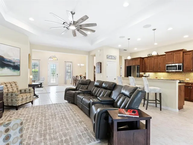 a spacious bathroom with a double vanity sink a mirror and a shower