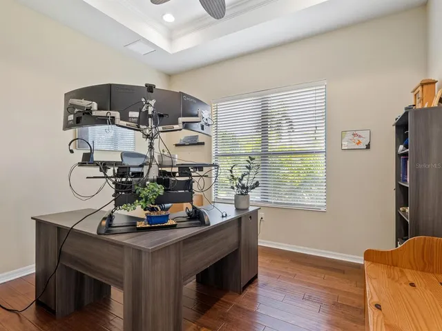 a view of a swimming pool with a patio