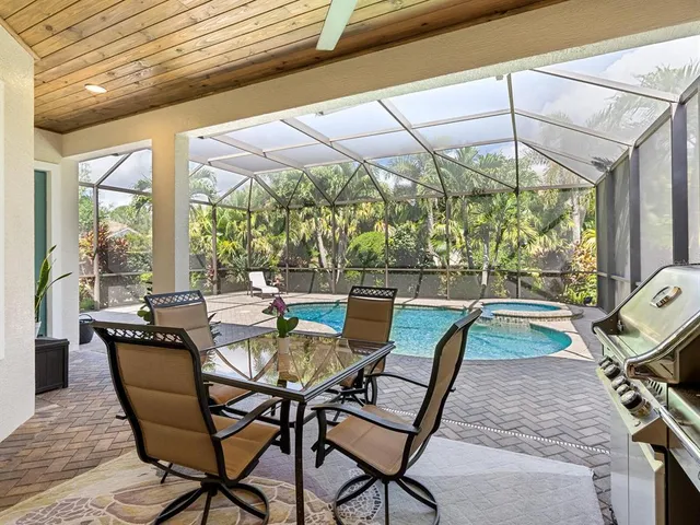 a view of a garden with a house