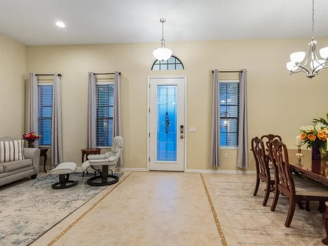 a view of a garden with a house