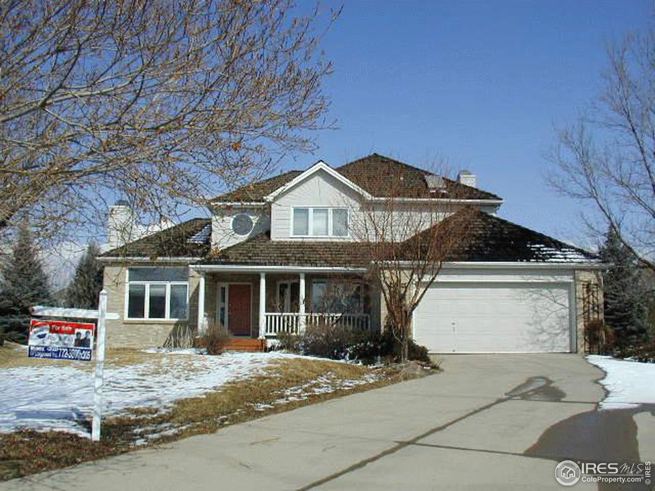 7229 Four Rivers Road Boulder, CO 80301 - Photo 1 of 12 a front view of a house with a garden and parking