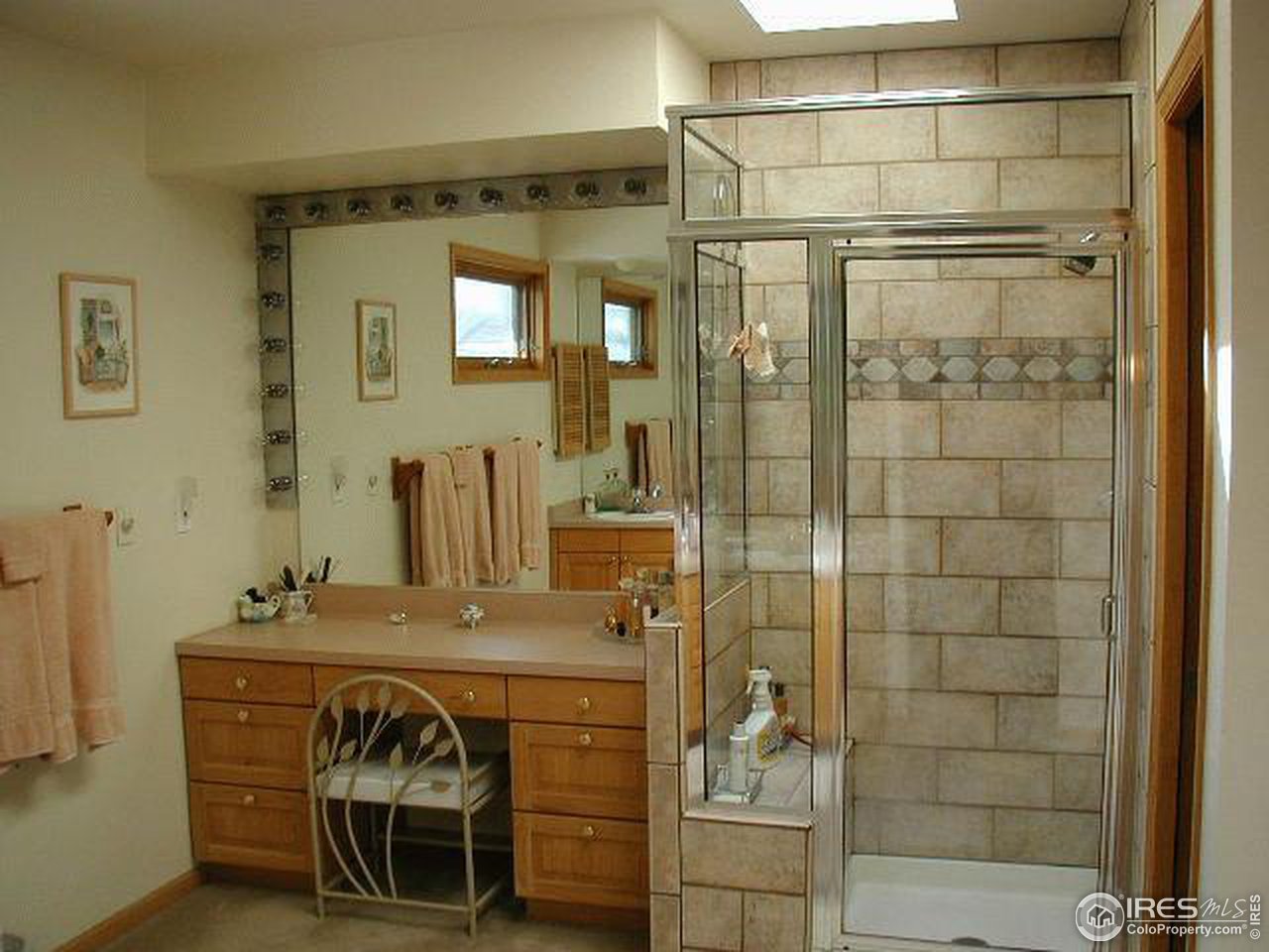 7229 Four Rivers Road Boulder, CO 80301 - Photo 12 of 12 a bathroom with a sink and a mirror
