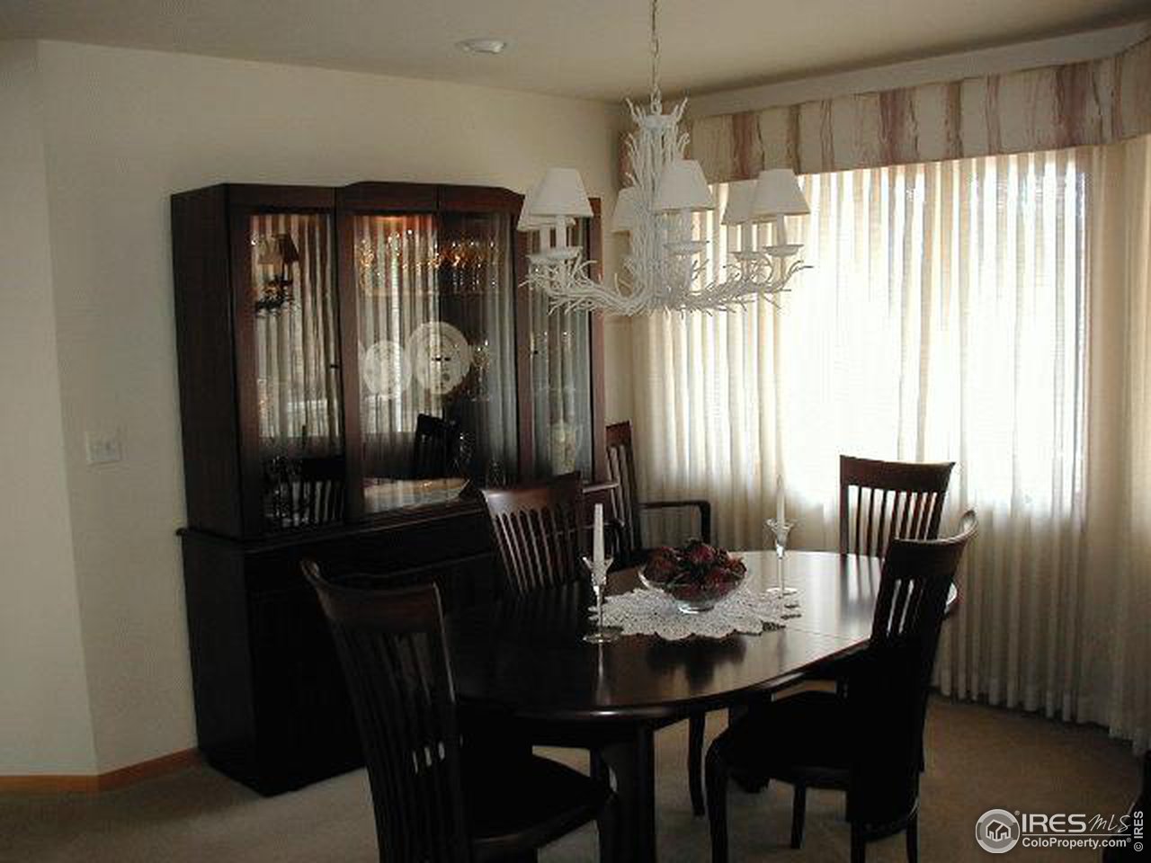 7229 Four Rivers Road Boulder, CO 80301 - Photo 8 of 12 a view of a dining room with furniture and window