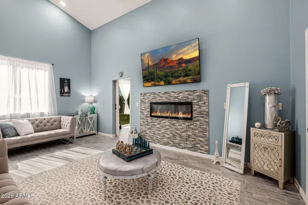 a dining room with furniture and window