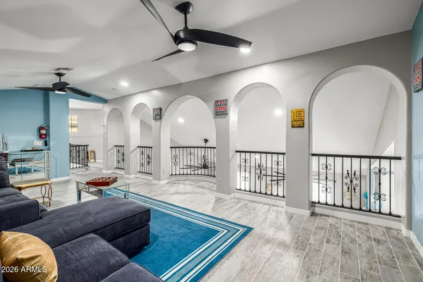 a bathroom with a double vanity sink toilet and shower