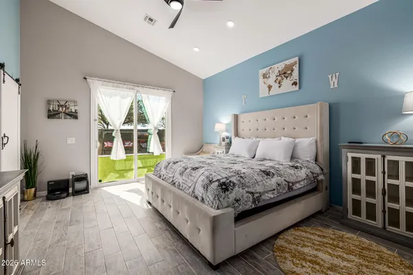 a view of swimming pool with seating area and furniture