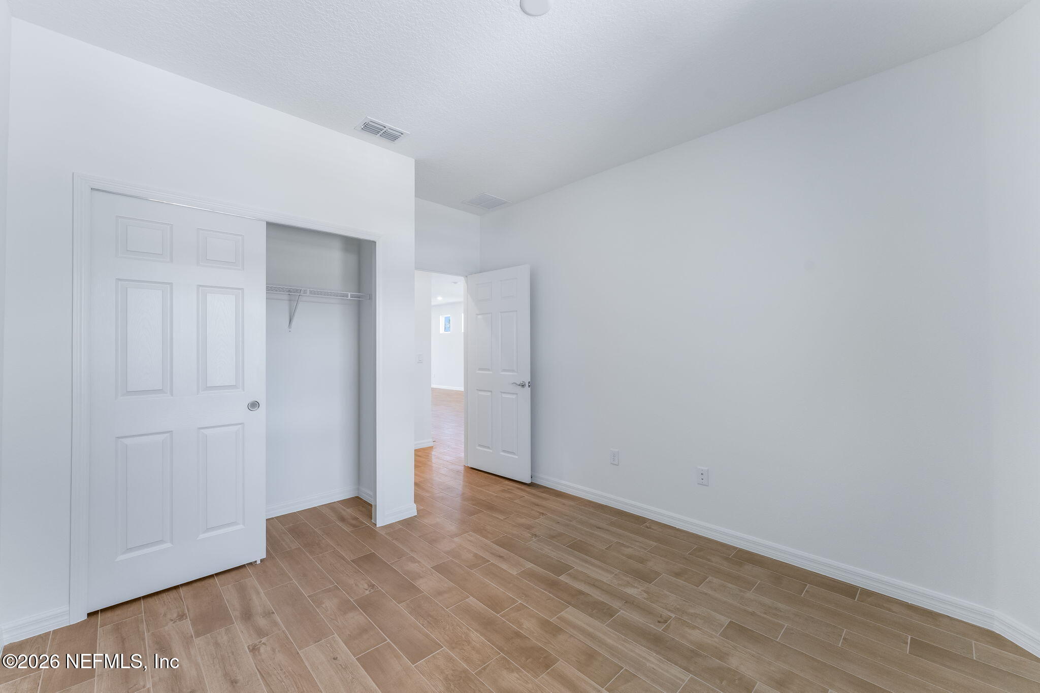 261 Ecliptic Loop Yulee, FL 32097 - Photo 32 of 61 33-web-or-mls-Guest Bedroom