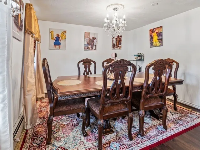 a view of a dining room with furniture