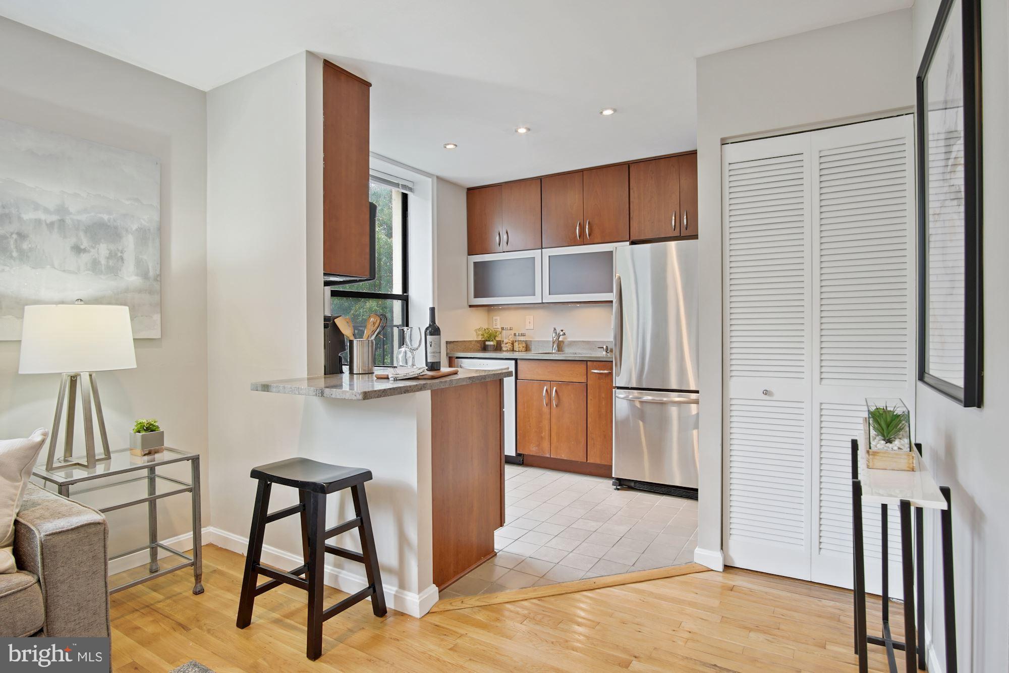 2145 California Street Northwest, Unit 201 Washington, DC 20008 - Photo 12 of 30 Open kitchen with breakfast bar