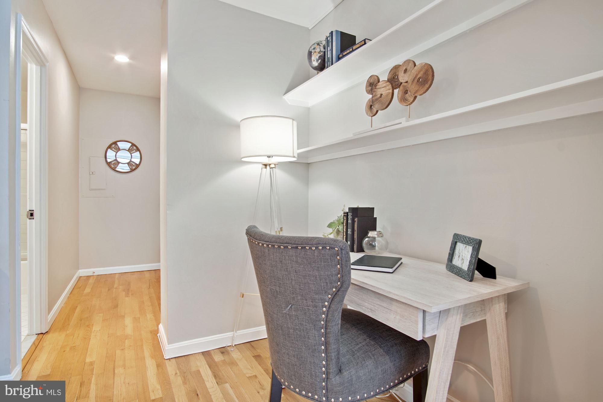 2145 California Street Northwest, Unit 201 Washington, DC 20008 - Photo 21 of 30 Home office area; Entrance hall with coat closet