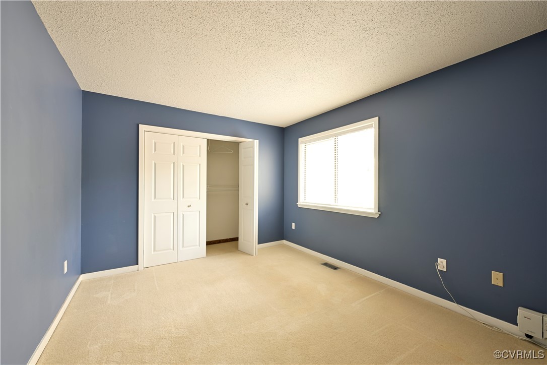 6610 Glebe Point Road Chesterfield, VA 23838 - Photo 17 of 36 a view of an empty room with a window