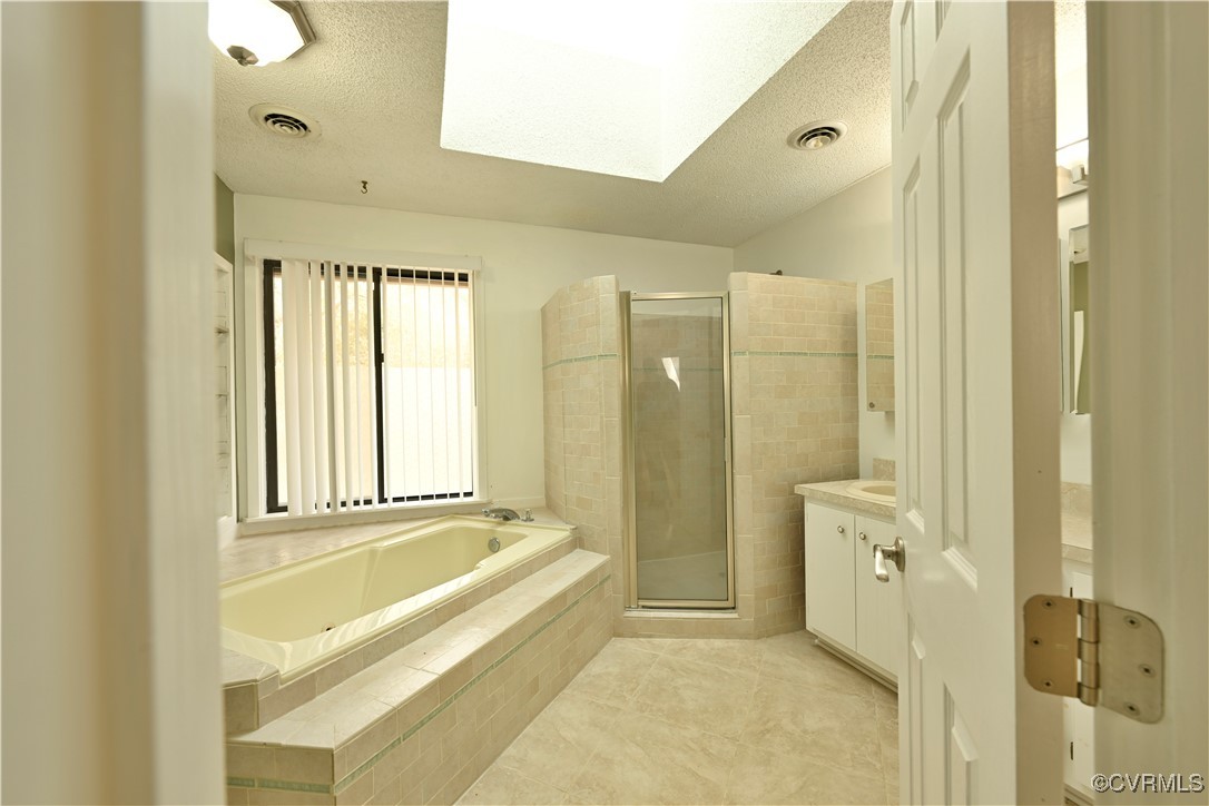 6610 Glebe Point Road Chesterfield, VA 23838 - Photo 25 of 36 a bathroom with a bathtub and a shower