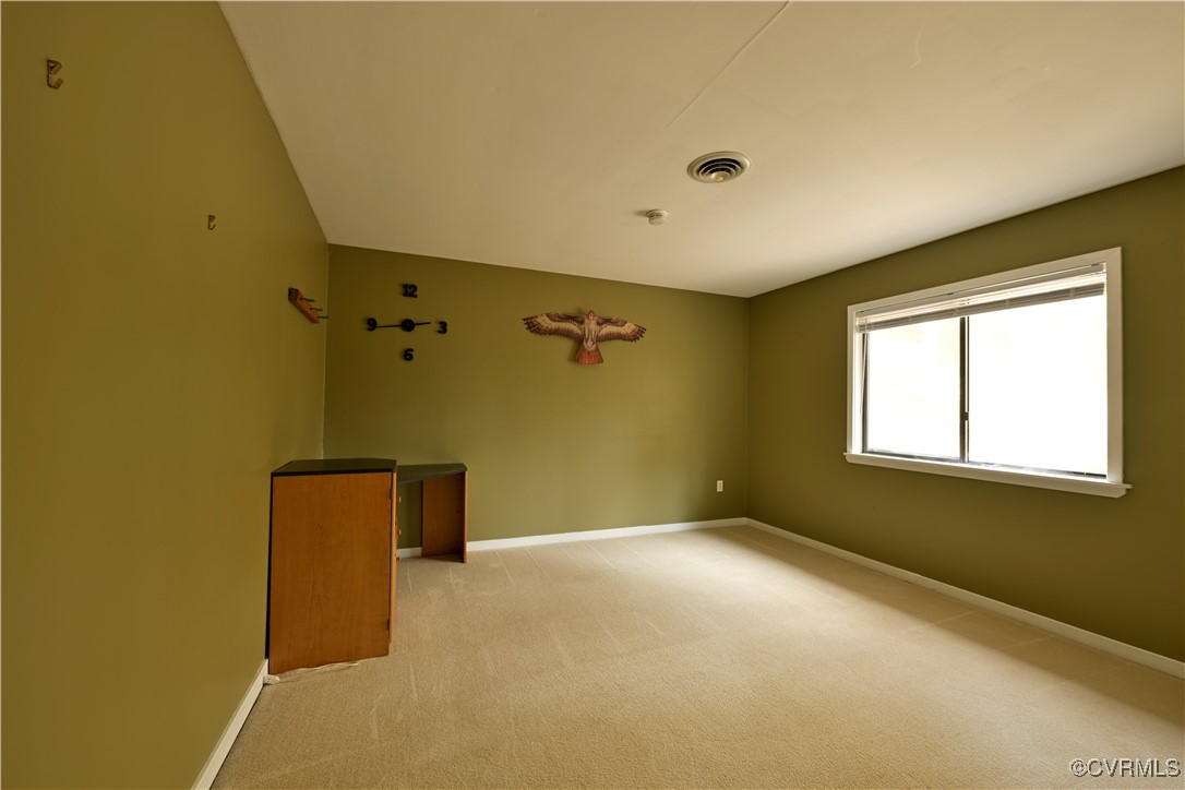 6610 Glebe Point Road Chesterfield, VA 23838 - Photo 31 of 36 a view of a livingroom with a window