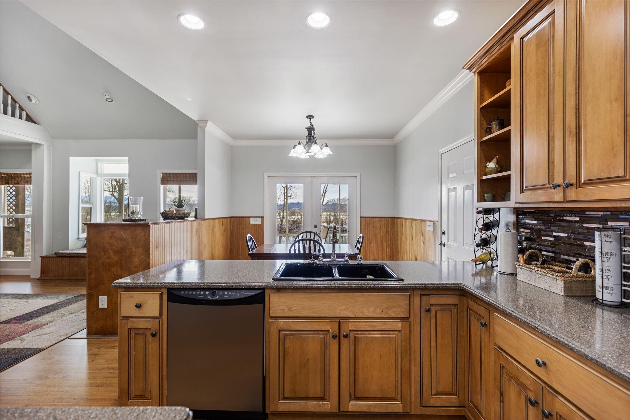 759 Pinhook Road Calhoun, TN 37309 - Photo 14 of 55 a kitchen with granite countertop a sink cabinets and stainless steel appliances