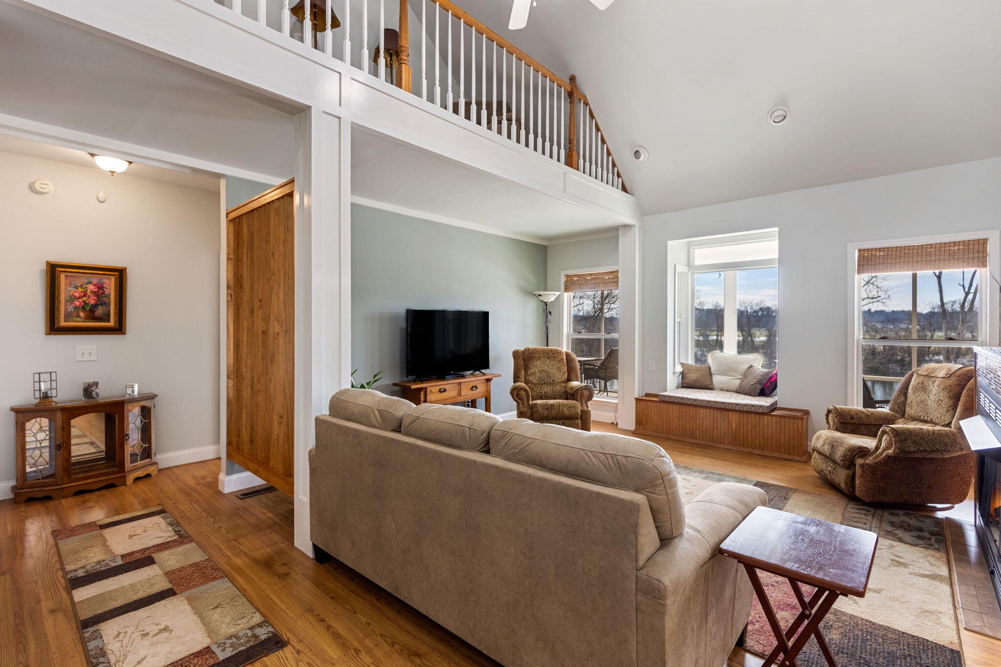 759 Pinhook Road Calhoun, TN 37309 - Photo 19 of 55 a living room with furniture and a flat screen tv